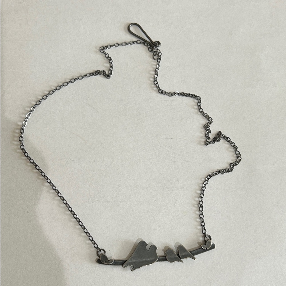 Elegant Silver Necklace with Bird Design